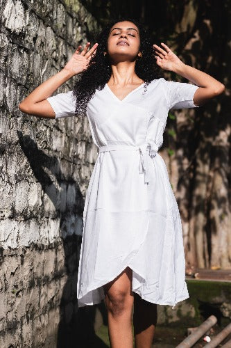 White Dress in Linen Lyocell fabric by Earthy Route, a sustainable clothing brand. The fabric is breatheable and summer friendly. This product has freeshipping.