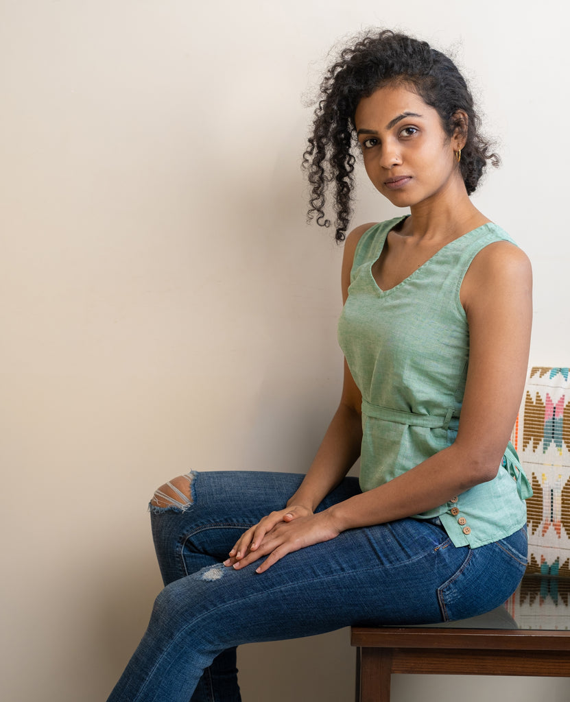 Green Sleevless Top in Linen Lyocell fabric by Earthy Route, a sustainable clothing brand. The fabric is breatheable and summer friendly. This product has freeshipping.