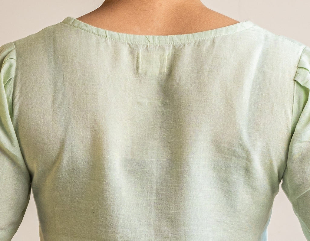 Light Green Top in Linen Lyocell fabric by Earthy Route, a sustainable clothing brand. The fabric is breatheable and summer friendly. This product has freeshipping.
